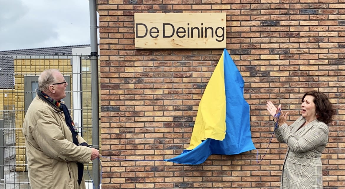 Onthulling bouwbord